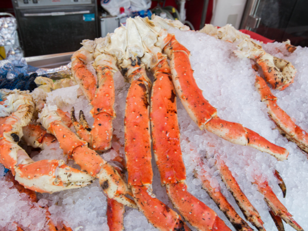 Fresh crab legs on ice