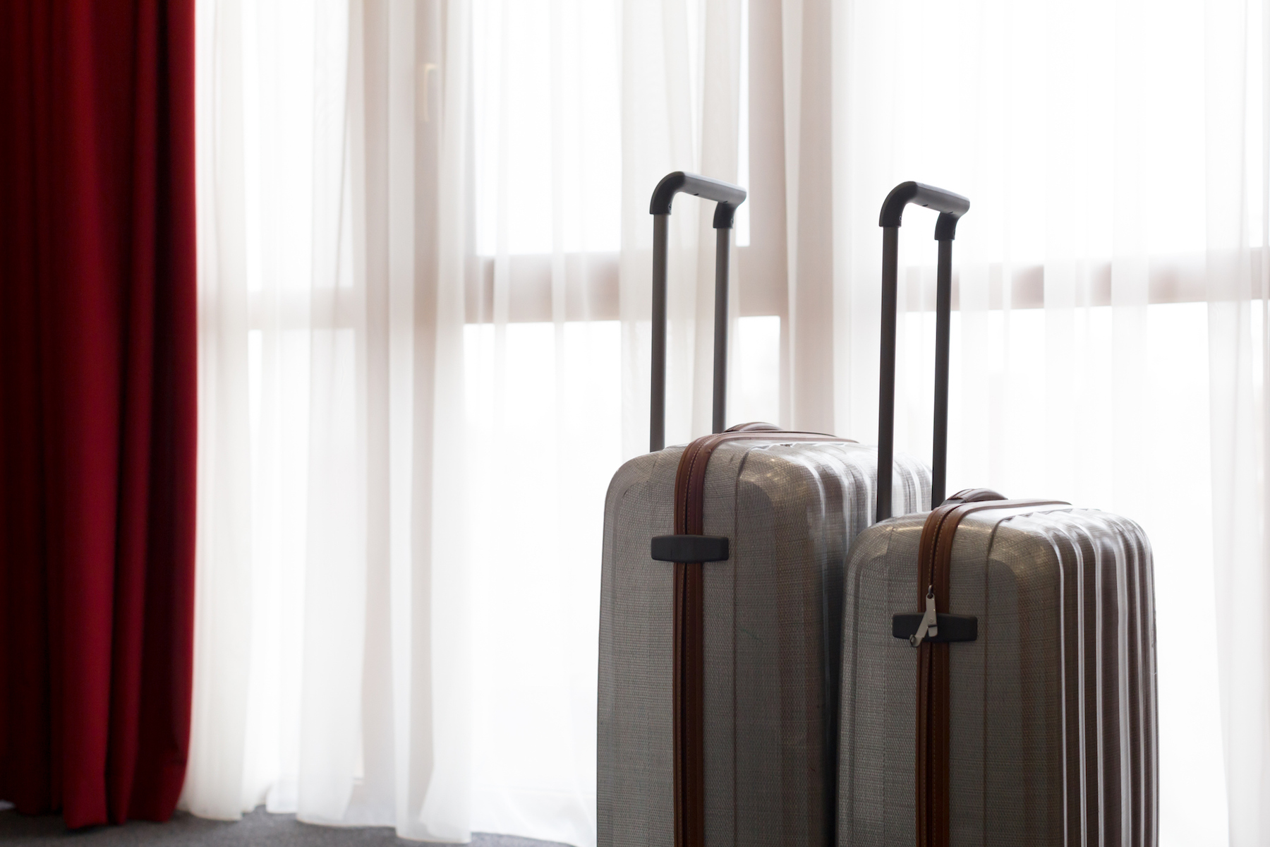 Suitcase or luggage bag in a modern hotel room